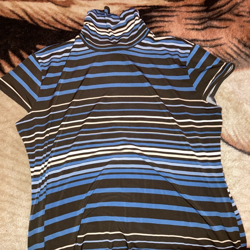 A multi colored stripe shirt.